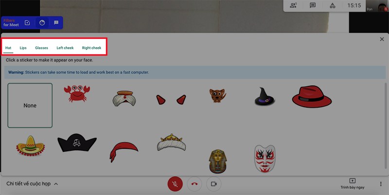 Nhấn vào sticker mà bạn muốn dùng. Tại đây, sẽ có nhiều dạng sticker để bạn dễ dàng lựa chọn như nón, môi, kính,... Cách sử dụng filter, sticker trên Google Meet để làm đẹp cực đơn giản